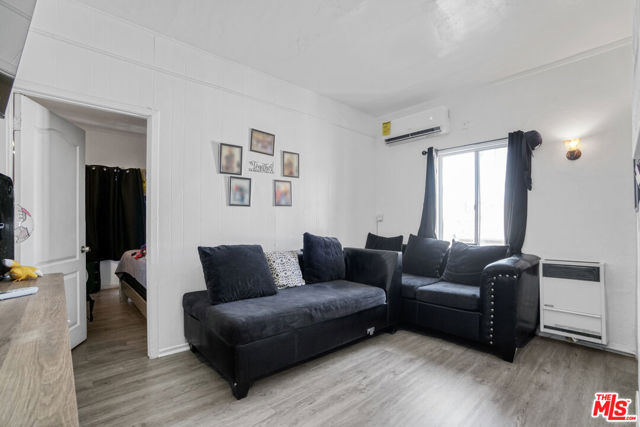 2074 W 54th Street, Los Angeles CA: https://media.crmls.org/mediaz/c2a3e888-e16f-4a88-8c48-891c6f09db3e.jpg