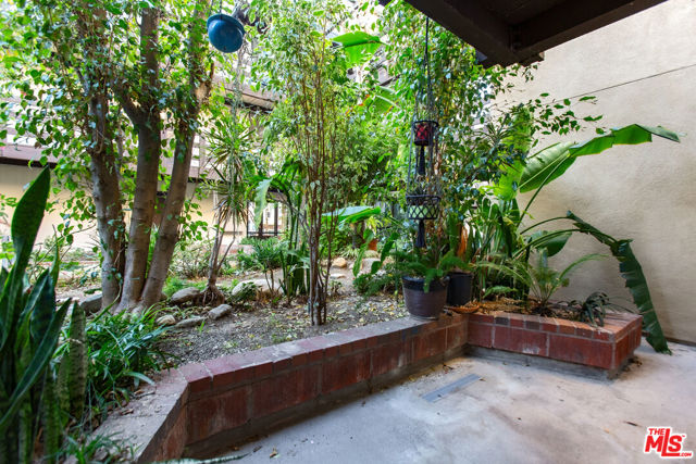 Private patio area with a verdant view!