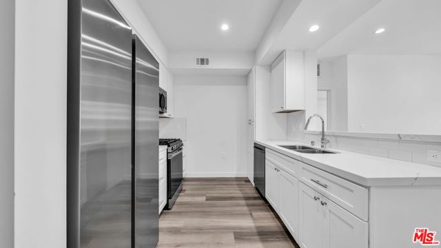 627 N Dillon Street, Los Angeles CA: https://media.crmls.org/mediaz/c2cb539b-bd6c-4763-98a0-ce616d64c044.jpg