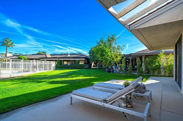 Back Patio to Greenbelt and Pool