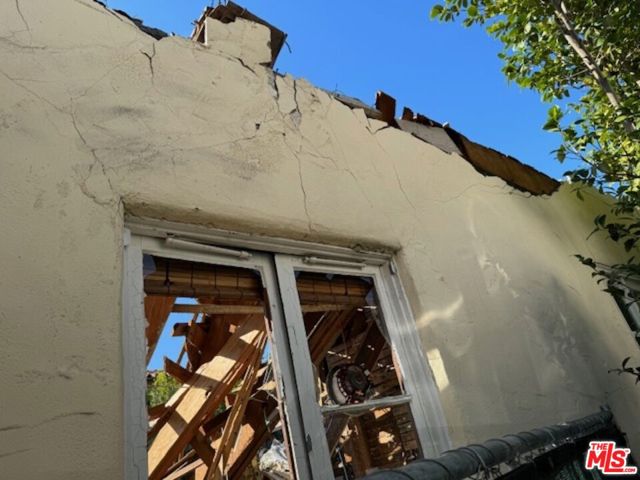 EXTERIOR NORTH WALL OF HOUSE