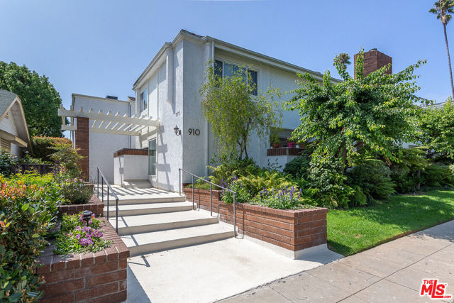 910 19th Street 10 Santa Monica, California Beautiful Santa Monica South of Montana townhouse! This gorgeous 2BR/2.5BA townhome PLUS basement bonus room is an inviting mix of transitional style and modern amenities. With a definite modern farmhouse vibe, sunshine galore, and all the accoutrements, you can move right in and call this property home. Beautiful, remodeled kitchen with white shaker cabinets, tasteful granite counters, stainless steel appliances and full-size dining area. The well-appointed step-down living room with attractive built-ins and romantic fireplace opens onto your own private patio - a perfect spot to practice your container-garden skills! The bright and sunny second floor features large window and skylights to maximize the natural light. 2 spacious bedrooms, including the primary with lofted ceilings, expansive closets, and a stylish en-suite primary bath. Real laundry room upstairs! Downstairs, a bonus room serves currently as private gym but office, storage, or media room are all great options. Direct-entry 2-car sxs parking, central HVAC, secure courtyard building. All of this in one of the best locations in Santa Monica just blocks to shops, restaurants and services on chic Montana Ave, a short jaunt to the beach, and close to Brentwood, Westwood and more!
