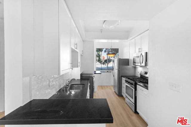 2033 Beloit Avenue, Los Angeles CA: https://media.crmls.org/mediaz/c373375e-994c-4ec3-a604-26a20c9c58d9.jpg
