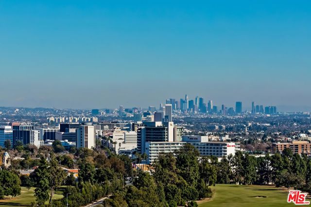 1200 CLUB VIEW Drive 1500 Los Angeles, California One of the most exquisite units to come to market in the highly coveted Beverly West, this full-service luxury building is located mere steps from Beverly Hills and Century City and offers an incomparable lifestyle of sophistication. An elevator delivers you directly into your dedicated foyer and you are immediately surrounded by walls of windows and the jaw-dropping unobstructed views to the ocean, downtown, mountains, and golf course/Los Angeles CC. Sold fully furnished with exclusive art, furniture, a completely stocked chef's kitchen, and operating systems controlled by your iPad for effortless living. World-renowned developer Emaar Properties', builder of the Burj Kalifa/Dubai, created the Beverly West to be the epitome of luxury living in Los Angeles, and they did not disappoint. Concierge service, 24 hour security, valet, conference, Pilates, and massage rooms, fitness center, saltwater pool, and the list goes on. Like new property as the owner was only in residence approx. 60 days post completion. An incredible opportunity!