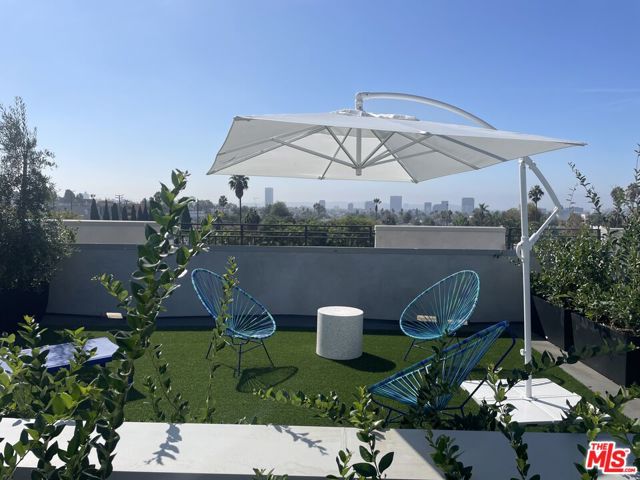 857 N Hayworth Avenue, Los Angeles CA: https://media.crmls.org/mediaz/c46b0951-d0ed-4a56-a004-de5dedec2d45.jpg