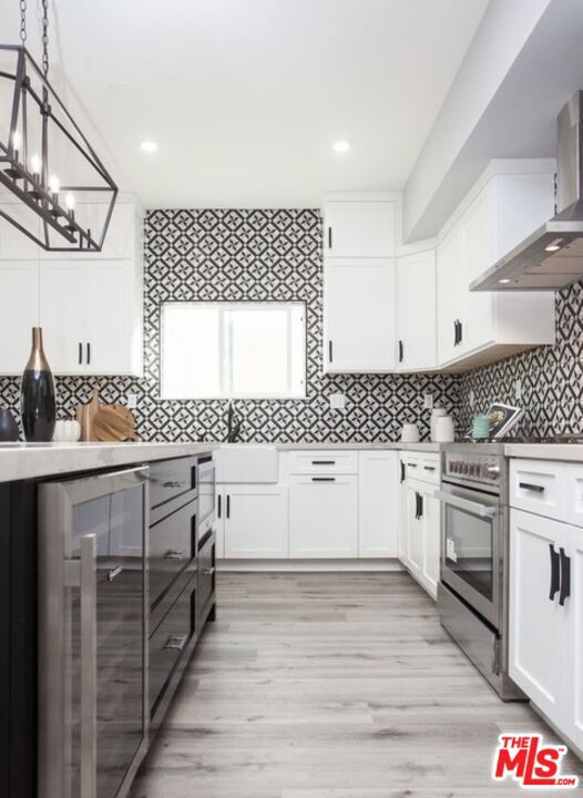 433 S Wilton Place, Los Angeles CA: https://media.crmls.org/mediaz/c4d378e0-180e-4fe9-b507-f1ce6dbc990f.jpg