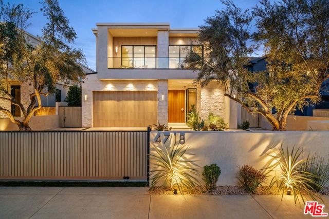 4718 Lemona Avenue Sherman Oaks, California Experience exceptional design and craftsmanship in this brand-new contemporary masterpiece by MLR Development. Located in the vibrant neighborhood of Sherman Oaks, this thoughtfully designed four bedroom, five bathroom home offers all that you have been looking for in a quintessential California living home.Inside, soaring ceilings and sleek glass doors create a seamless indoor-outdoor flow, while the open-concept layout enhances the home's light, airy atmosphere. The gourmet kitchen is a true showstopperoutfitted with Miele appliances, porcelain stone, an oversized island with seating and 35 feet of collapsing doors leading to the private backyard. The dining room is situated between the kitchen and a floating corner courtyard featuring a mature olive tree, for the perfect alfresco summer nights.On the main floor you will also find a conveniently located bedroom with private bath perfect for guests or a home office. Upstairs are three additional bedrooms featuring their own private en-suite bathrooms and balconies for maximum comfort and privacy. The laundry room also upstairs, is well equipped with custom storage cabinets, marble counters and a sink. The luxurious primary suite is your perfect getaway. Flooded with natural light during the day and perfect ambiance from the glow of the fireplace in the evenings. The custom walk in closet is thoughtfully designed and laid out while the luxurious bathroom is equipped with a soaking stand-alone tub, dual vanities, and a walk-in dual shower. The two others bedrooms both include custom designed cabinet closets and beautifully designed en-suite bathrooms.Downstairs through large glass doors, step outside to your private backyard retreat, complete with an expansive pool, relaxing spa, built-in outdoor barbeque, and lush privacy landscapingideal for entertaining or unwinding in true California style.Just moments from the shops and dining of Ventura Boulevard, this fully integrated smart home blends convenience, style, and technology. Don't miss your chance to make this your home.