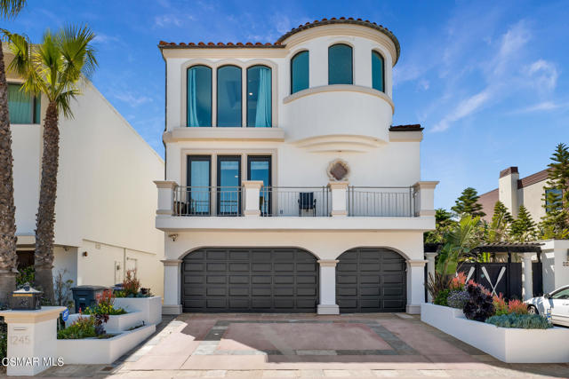 Welcome to this stunning Mandalay Beach oceanfront home with over 5,400 square feet of living on the ocean side of Capri Way! Step into the elegant glass door entry that leads you to the main level of the home with soaring ceilings bringing in abundant natural light. Wake up each morning with beautiful Island Views and listen to the waves along the surf with dolphins and whales at times.  This home was made for entertaining showcasing ocean views from almost all of the primary areas in the home. The newly remodeled kitchen is complete with new high-end appliances, center island, butler's pantry, and plenty of cabinet and counter space. The dining room and living rooms are located off of the kitchen and feature a wet bar, fireplace, and sitting area overlooking the beach perfect for soaking in the sunny days and sunsets in the evening. Downstairs you will also find a bedroom with an en suite bath, and a junior guest suite that runs on its own water meter and kitchenette providing an opportunity to be a guest suite or rented if desired. The beautiful spiral staircase leads you to the spacious loft and another bedroom with an en suite bathroom. The elegant primary suite is the perfect space to unwind with stunning beach and ocean views, additional sitting areas, cozy fireplace, and deck overlooking the ocean.  There is even a separate room perfect for an office, gym, or nursery, and bathroom with dual vanities, soaking tub, and steam shower. Other amenities of the home include a new roof, new air conditioning for second floor, LED lights throughout, newly redone decks, new exterior paint, whole house water filtration system, remote control drapes on the first floor, outdoor shower, and so much more! Come see why everyone is moving to Mandalay Beach of Oxnard Shores, the hidden gem between Malibu and Santa Barbara.