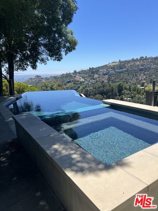 2753 Nichols Canyon Road, Los Angeles CA: https://media.crmls.org/mediaz/c64e2da4-1b99-4b24-9114-936a1d53f7fb.jpg