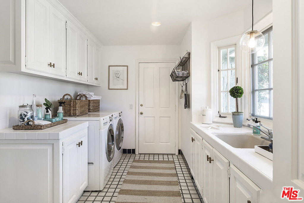 Laundry Room with access to 3 car garage