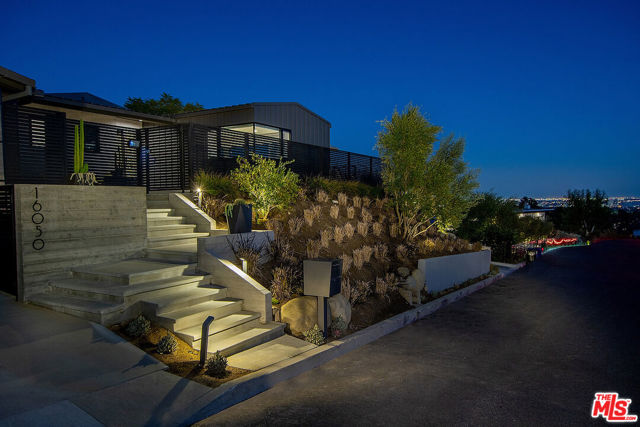 Experience a new level of excellence where art meets design, overlooking panoramic Queens Necklace ocean views by day, and jewel-like city lights views by night.   This home is the perfect coupling of warm, modern sophistication and Californias indoor-outdoor lifestyle. Featuring superior quality in all aspects and materials. Set above street level, this inviting home that was built in 2019 has walls of glass throughout, allowing one to enjoy the views while maintaining perfect privacy.  Open living/dining rooms with fireplace seamlessly connect to the outdoor living space. Adjacent to the living room is a home office with breathtaking views and built-in cabinetry. Chef's kitchen with Miele appliances, Franke kitchen faucet, sleek Leicht cabinetry, and custom wine refrigerator. The primary bedroom suite with stunning bath complete with electric mirrors, Graff faucets, a true soaking tub and a luxurious Thermasol steam shower. See attached documents for full list of features