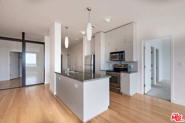 3810 Wilshire Boulevard, Los Angeles CA: https://media.crmls.org/mediaz/c8698d36-2bba-451a-b8ad-c88892f26edb.jpg