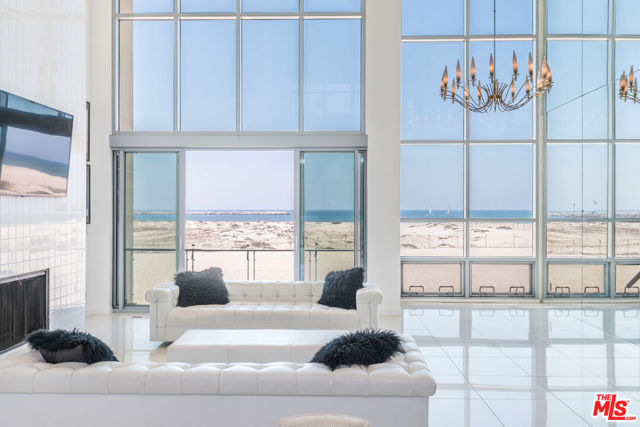 5205 Ocean Front Walk 203 Venice, California Rare opportunity to lease a luxury penthouse in Marina Del Rey on the sand. This masterpiece features floor-to-ceiling windows throughout that capture breathtaking unobstructed ocean views/ Marina. This beautiful architectural home boasts 3 bedrooms and 4 baths with state-of-the-art appliances. Modern architectural features with steel and glass throughout. Enjoy sitting and watching the ocean, marina, and sailing from your living room, dining, kitchen, or bedroom. Plus 3 car parking and additional guest parking.