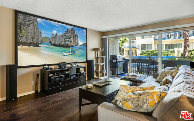 Picturesque wi patio adjacent to living room