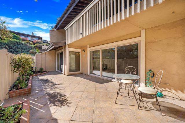 Sun-drenched patio with built-in flower boxes