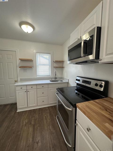 1143 D St, Hayward CA: https://media.crmls.org/mediaz/c9273f2a-f9d5-4eb3-a49f-bd1c7f8f6d43.jpg