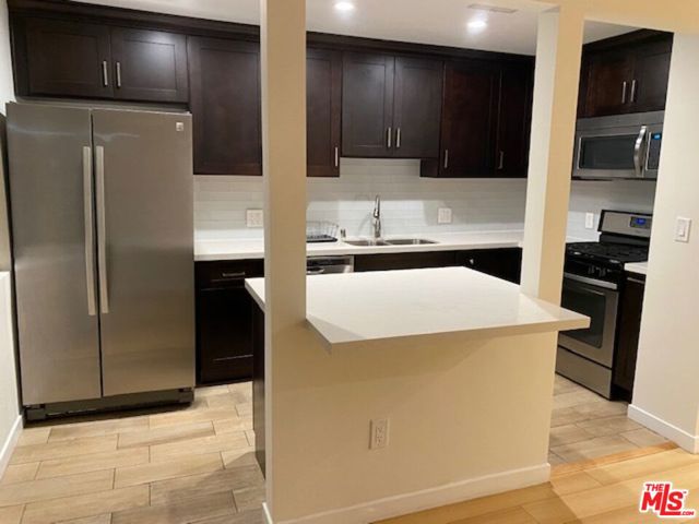 1466 S Canfield Avenue, Los Angeles CA: https://media.crmls.org/mediaz/c9cfc971-30e7-43f1-8753-e7b492053eab.jpg