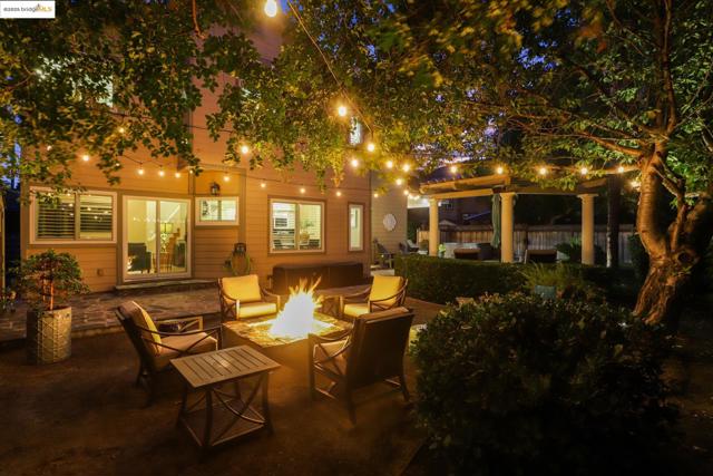 View of patio featuring a fire pit