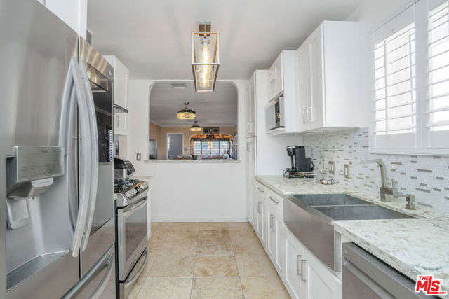 7815 S Halldale Avenue, Los Angeles CA: https://media.crmls.org/mediaz/ca003ee3-653a-4260-81b1-0c19758603cc.jpg