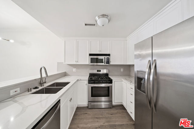 2335 S Bentley Avenue, Los Angeles CA: https://media.crmls.org/mediaz/ca0067ac-b98d-42c5-bdeb-8146b67702cb.jpg