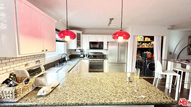 800 N Hobart Boulevard, Los Angeles CA: https://media.crmls.org/mediaz/ca5a558a-0c56-4884-b32a-135ff9b5a78c.jpg