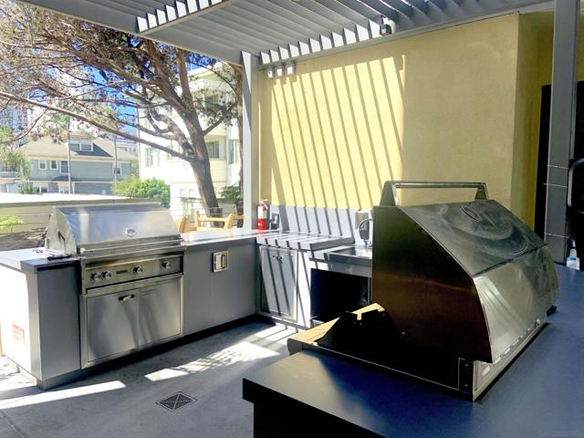 889 Date St, San Diego CA: https://media.crmls.org/mediaz/ca9d922d-0bfc-4a26-8101-0eedcdd1821f.jpg
