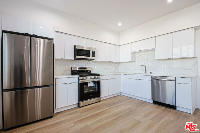 954 N Kingsley Drive, Los Angeles CA: https://media.crmls.org/mediaz/cc03f00b-0cd9-4d83-83b8-20fa433a67c6.jpg