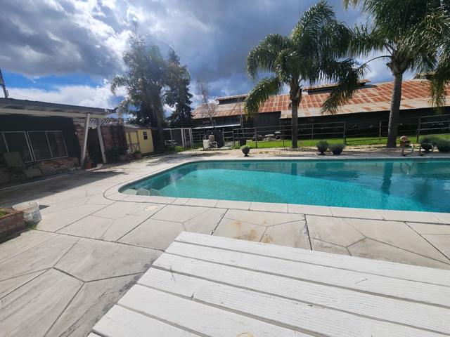 14205 Sycamore Avenue, San Martin CA: https://media.crmls.org/mediaz/cd7759fd-b2d6-4213-b238-c16a984e6fe9.jpg