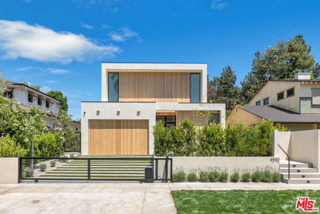 4046 Shadyglade Avenue Studio City, California Where design meets intention. This fully custom home north of Ventura Blvd is a rare offering in Studio City's most coveted enclave, just minutes from Erewhon, Equinox, The Shops at Sportsmen's Lodge, and top-rated Carpenter Elementary.Every element of this home was curated with care: plaster walls with molded paint, rustic white oak beams and doors, limestone fireplace, and custom skylights all throughout the home. The chef's kitchen features JennAir, Monogram, and Bosch appliances, all powered by a top-tier electric system designed for ultimate efficiency.The primary suite offers two private balconies and a spa-inspired en-suite with Restoration Hardware vanities. A detached ADU with its own high-end appliances provides endless flexibility. This house is it's a custom, detail-rich retreat designed to feel like a modern resort. A rare combination of thoughtful luxury, timeless materials, and one of LA's best locations.