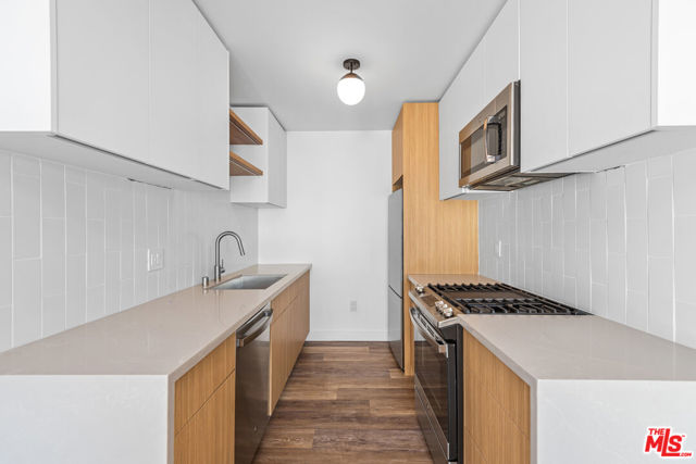 1563 Gordon Street, Los Angeles CA: https://media.crmls.org/mediaz/cddd1f4b-1796-49b7-bf93-44a0316d9560.jpg