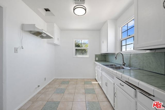 2122 W 102nd Street, Los Angeles CA: https://media.crmls.org/mediaz/ce6a60ad-18a6-4400-9c89-032758a37736.jpg