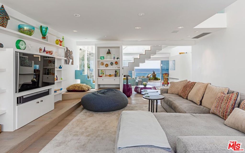 Den/Media Room with Floating Stairs