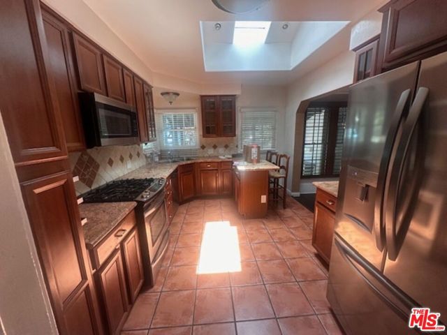 4715 Camellia Avenue, North Hollywood CA: https://media.crmls.org/mediaz/cea6f63d-0286-4d76-91cb-c978f94e05c5.jpg