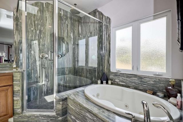 Private spa tub, granite tiled shower in 1st home.