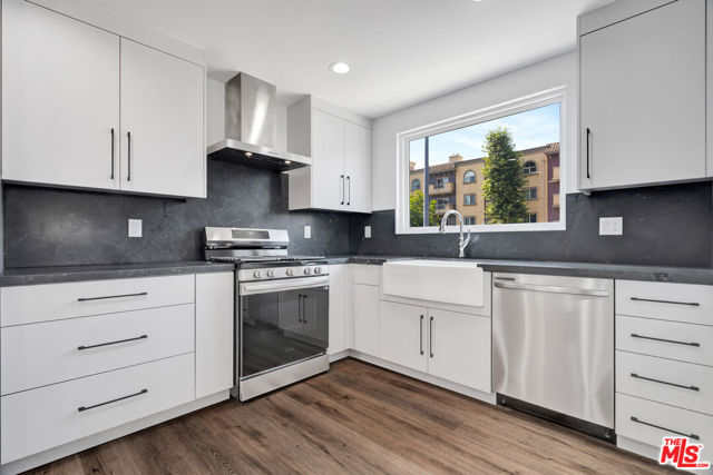 11611 Burbank Boulevard, North Hollywood CA: https://media.crmls.org/mediaz/cf212494-2e53-422b-a18f-e6b2e70bdf99.jpg