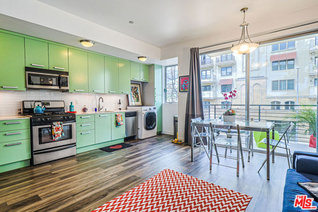 Kitchen and Dining Area to Balcony