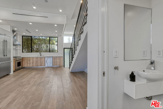 1445 1/4 N Martel Avenue, Los Angeles CA: https://media.crmls.org/mediaz/d09a339c-07cf-4589-bfc6-37fdcc32c457.jpg