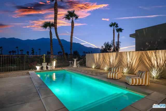 929 Bernardi Lane Palm Springs, California Location is always the key isn't it? Direct panoramic mountain views with stunning sunsets and the occasional snow capped mountains are the dramatic backdrop to this immaculate and stylish home located in guard gated Escena in Palm Springs. Step inside and find an updated and fresh look featuring soothing tones in the great room with floor to ceiling sliders that make those incredible views your living art. Gas fireplace in the great room and built in shelving and storage warm the space and designer lighting in the dining area. The "Forte" model was one of the most popular by award winning architect Anthony Poon and the location where this home is sited is near where the model homes used to be for a very specific reason, the view. The oversized primary suite also feature those stunning views and spa bathroom with double sinks, soaking tub and two oversized closets. Two additional suites for your guests (or office perhaps) and additional powder. The West facing sliders also have automated canopy cover to shield living areas on warmer days or shade yourself as you sit by the pool area or perhaps a quick rinse in the private outdoor shower. Plenty of lounging space outside and views of the golf course greenery add to the expansive view. Escena is such a great valley location overall and the location of this property in Escena, near the clubhouse, restaurant, CV Link and close proximity (but not too close) to vehicle and air thoroughfares, add to the list of features. If you want a discerning, stylish and tasteful home with jaw dropping views - we welcome you home. This home is also listed for Lease MLS# 219088518PS