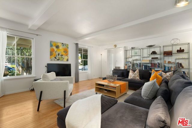 248 19th Street Santa Monica, California First time on the market in 47 years! Incredible opportunity to remodel / build in Gillettes Regent Square on a 60-foot wide, 8,941 square foot lot. This property is on the west side of the street for a sunny backyard! Bring your designer/ architect to create your dream home in this highly sought-after neighborhood in the coveted Franklin school district. The existing house has a total of five bedrooms and four bathrooms. The front of the house with hardwood flooring has a charming light and bright living room with a white beamed ceiling and a cozy fireplace. French doors in the living room lead to a delightful atrium. Good-sized galley kitchen has a stacked washer & dryer in closet. Primary suite on the ground floor has sliding glass doors opening to the large grassy backyard. An abundance of storage throughout. A good-sized family room with parquet wood flooring has large glass doors (French and sliding) that lead to the lovely atrium. A secondary kitchen with a nice breakfast counter has been added to the family room. Stairway off family room leads to three bedrooms and two baths. Two of these bedrooms have Jack and Jill bathroom and both have generous closets. Washer & dryer in upstairs walk-in closet. Peaceful & spacious, grassy, west-facing backyard has fruit trees and large patio. Fantastic location in the wonderful North of Montana neighborhood. Dont miss out!