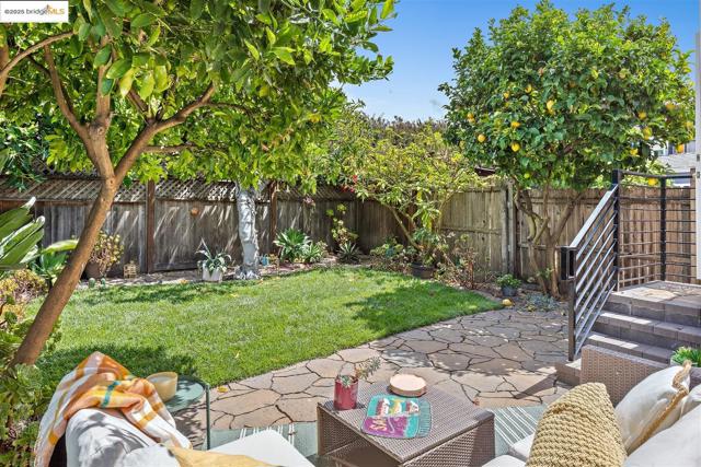 Fenced backyard featuring a patio area