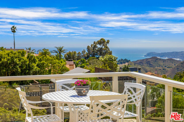 Incredible rare find--a 3 bed, 2 bath single family home in Malibu with breathtaking views of Point Dume and the ocean for under $2M! This home is offered fully furnished! You're surrounded by the natural beauty of Malibu, the peace of the mountains, and the magnificence of the ocean. Located at the end of a cul-de-sac for privacy, this home is close to hiking trails and Solstice Park. Breath in the fresh air as you sit on your deck and gaze at the sea. The fireplace will warm you in the winter. There are citrus trees in the back yard as well as a relaxing jacuzzi with views of Point Dume and the ocean. The primary bedroom offers a generous walk-in closet as well as additional access to the back yard. The primary bathroom features a steam shower, and heated floors. The kitchen has ample cabinets and granite countertops. If you've been dreaming of living the Malibu lifestyle, this home will answer those dreams.  It's a fabulous way to live in a wonderful neighborhood, and take advantage of living in the amazing coastal town of Malibu.