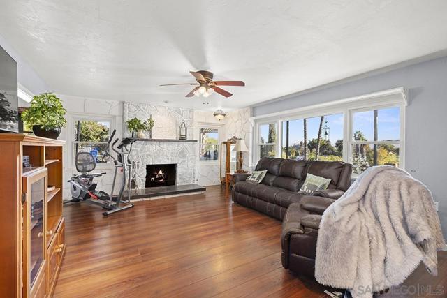 Family room with fireplace and direct access to the pool.