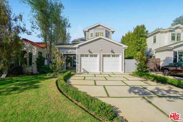 1051 Galloway Street Pacific Palisades, California Timeless Cape Cod in prime Alphabet Streets location, the most walkable neighborhood in Pacific Palisades minutes to the village. Enter this bright, tranquil custom-built home with its ample windows & skylights, vaulted ceilings, French doors, and inviting, sun-filled rooms. New custom Herringbone french oak floors throughout. Flow from the gourmet eat-in chef's kitchen with granite counters, huge island, custom cabinets, and new stainless steel appliances into a cozy family room overlooking an open yard filled with mature landscaping. The family, living and formal dining room connect seamlessly for casual lounging or entertaining and boast custom built-ins, crown molding, recessed lighting, and a fireplace to set the tone. The first floor bedroom/office provides needed space and privacy with an en suite bathroom. Upstairs, the luxurious master suite has a fireplace, dual walk-in closets, built-in bookshelves & cabinets & a sun-filled bathroom with dual basins, spa tub & separate shower. Two other bedrooms upstairs connect with a roomy jack and jill. Overall the home is warm and ready to move in and beautifully proportioned to the lot, so you get an idyllic yard for kids to play or a relaxed setting with mature trees, privacy, and patio.