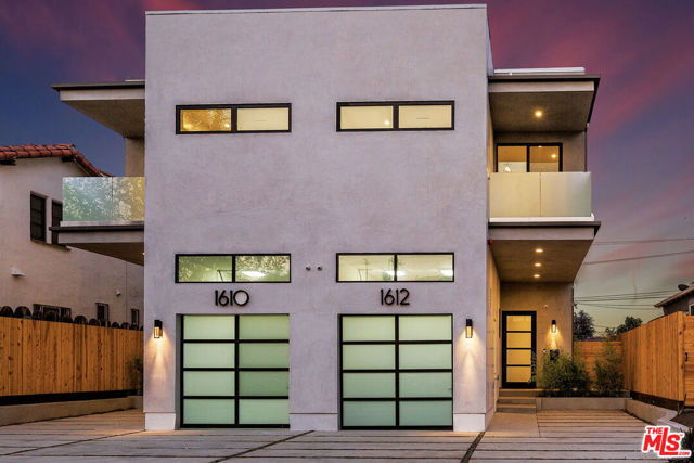 1610 S Wooster Street Los Angeles, California One of a kind, modern/contemporary duplex built by renowned developer, GME Development! Approx 5,396 sq ft featuring 8 bedrooms and 8 bathrooms. First floors feature powder rooms, laundry rooms, custom chef's kitchens featuring two sinks, top-line appliances, quartz counters, large center island, tons of cabinetry, and walk-in pantry. Open living floor plan with tons of natural light opens directly to backyard creating breathtaking entertaining spaces with surround sound speaker system. Second floors have 4 bedrooms, two of which have private balconies. Bedrooms have en-suite bathrooms, and designer quality custom closets and woodwork. Living rooms have large flatscreen TV's and each floor's HVAC is controlled by Nest system. High-end workmanship and finishes with incredible attention to all details. Take in city views with the accessible rooftop deck, featuring a great open entertaining area with a barbecue. Property also features video surveillance system.