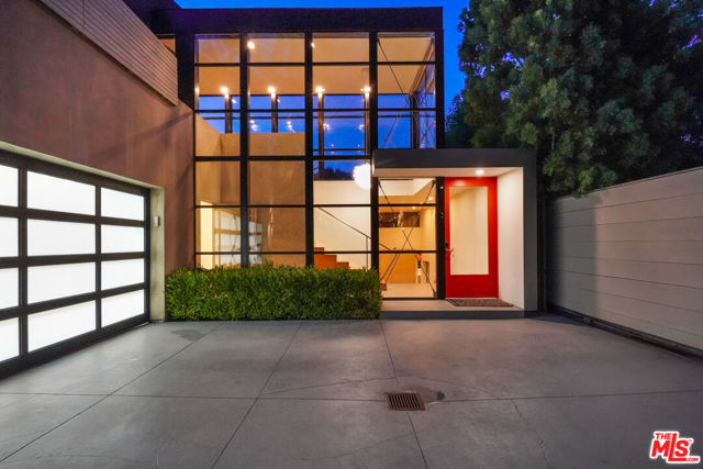 Offer Deadline - Monday 11/20/23, 6 PM.   Mid-Century Canyon Luxe. Hidden away in the sought after Lower Marquez Knoll neighborhood, a classic Ray Kappe Post and Beam 1956 home is seamlessly joined with a full remodel by Barbara Callas, and a "Bauhaus inspired bridge from the original structure to its striking addition: which rises through an arbor of oaks - an architectural allegory that spans 20th Century American Modernity to 21st Century Modernism." Enter the walled garden, and step down past a sleek pool, with a sheet of water spilling down, in this sylvan canyon setting, and enter the dramatic glass tower. The original expanses of glass and wood draw you to the serene canyon setting. Expansive glass walls, soaring ceilings, bold angles, and the strong geometry of Kappe's Post and Beam construct, all serve to make life here at one with the natural world, just outside the doors. A skylit library opens to a peaceful zen garden, meant for meditative mornings. The living room, warmed by a Mayan inspired fireplace, opens to a wide deck overlooking the seasonal creek below. A formal dining room sits next to an open plan kitchen, breakfast room, and second living room, and a bravura fireplace, and another garden, just outside walls of glass. The Main Suite is a Tour de Force of modernism setting your private life in the middle of the oak canopy. High ceilings and soaring walls of glass open to a private deck. A sybaritic, open, ensuite with Terrazo floors, a sleek tub, all set in a wetroom that opens to the pool. Get ready for your day in the luxurious, skylit walk in closet. On the lowest level, 2 more bedroom suites sit creekside. A Hue lighting system can be programmed to set any color mood. Just minutes from top-tier schools, upscale shopping, dining, entertainment, and the beach, this hideaway feels like it is a million miles away.