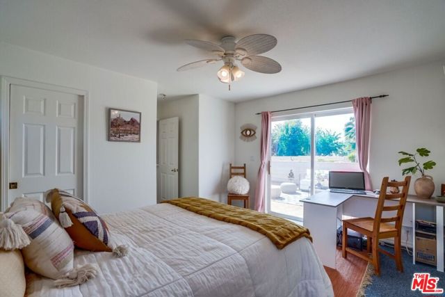 Upstairs bedroom with en suite bathroom and deck