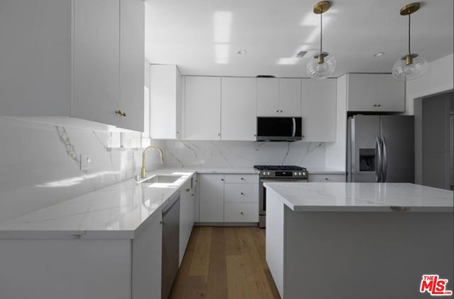 16130 Devonshire Street, Granada Hills CA: https://media.crmls.org/mediaz/d38026a7-2354-459c-8de4-a72f32b3809d.jpg