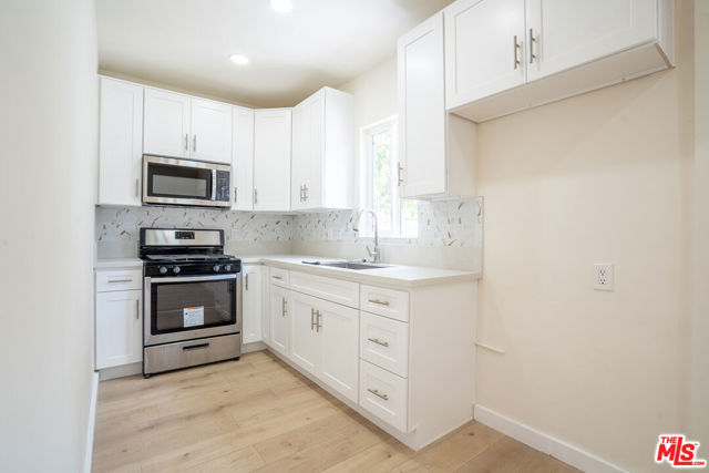 1245 S Berendo Street, Los Angeles CA: https://media.crmls.org/mediaz/d382a466-ce5d-4e96-b097-b6c8d05fec75.jpg