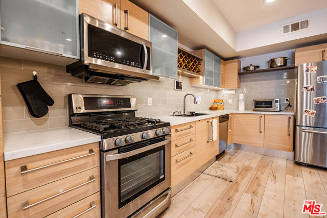 1234 Wilshire Boulevard, Los Angeles CA: https://media.crmls.org/mediaz/d4144f63-c8dd-42ad-913f-c0de7fd7a1ba.jpg