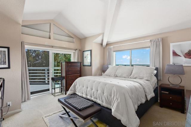 Spacious master bedroom with sliding door to balcony. Very nice for cool evening breezes